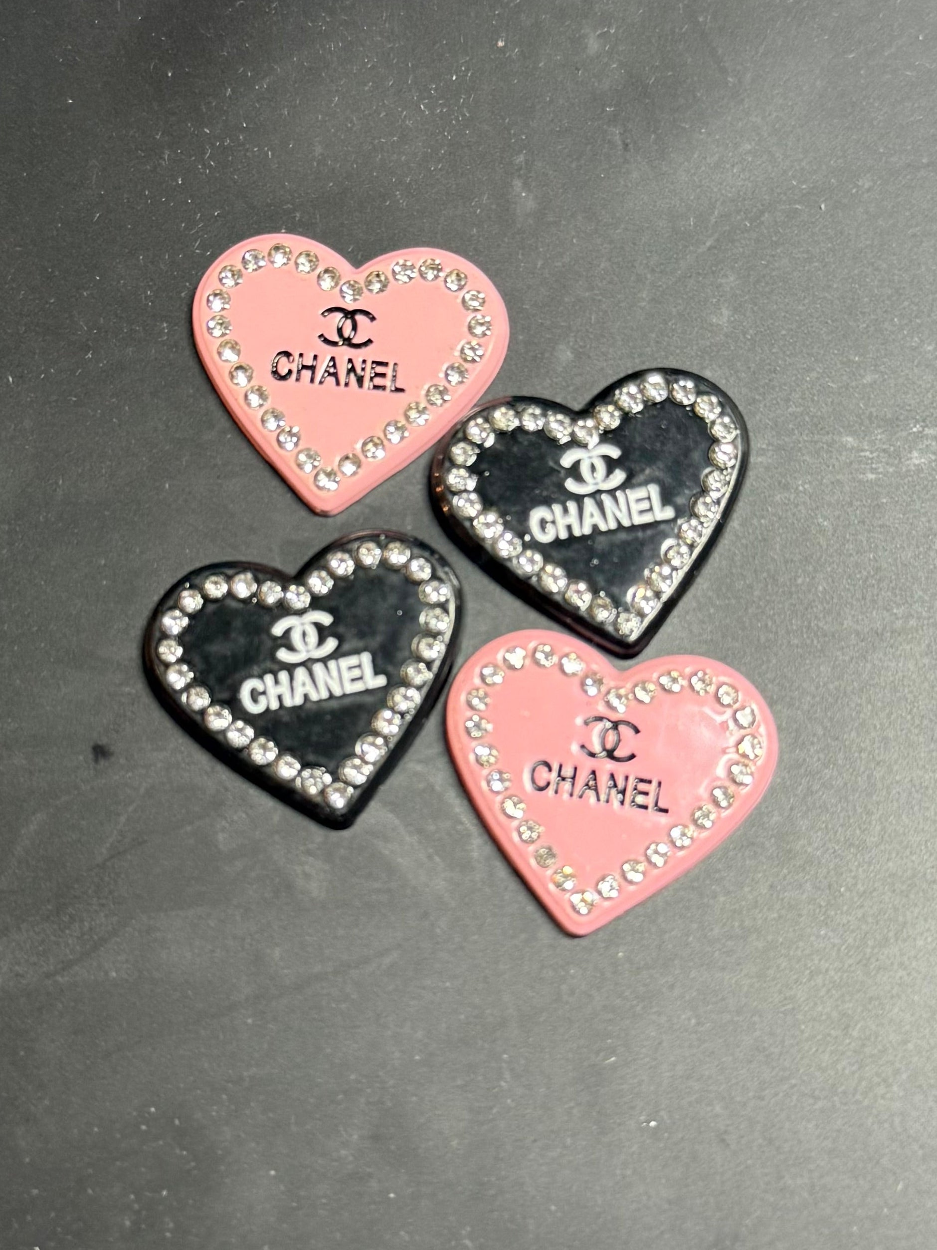 chanel heart charm with word