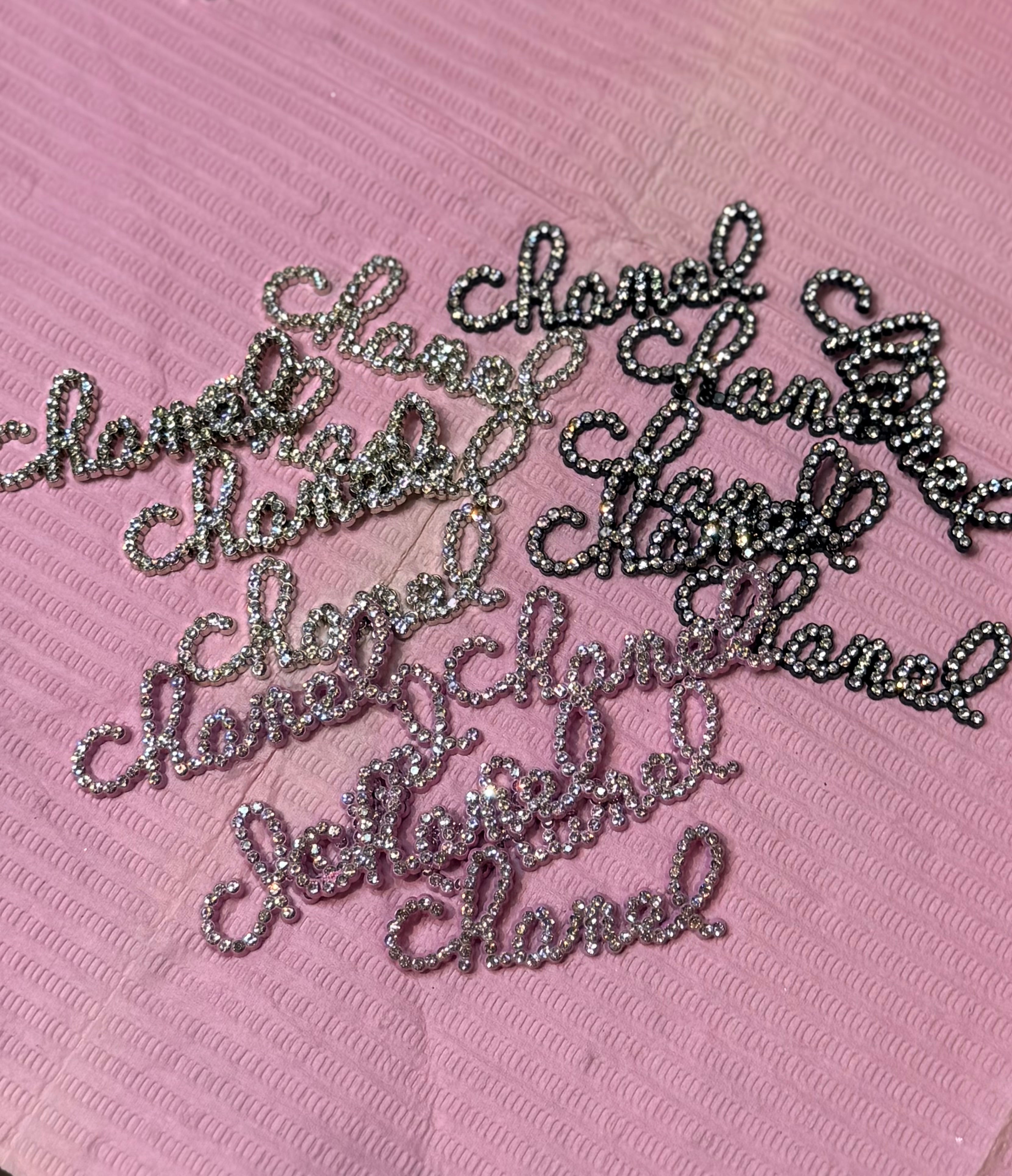 Chanel word charms