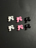 Small barbie head charm