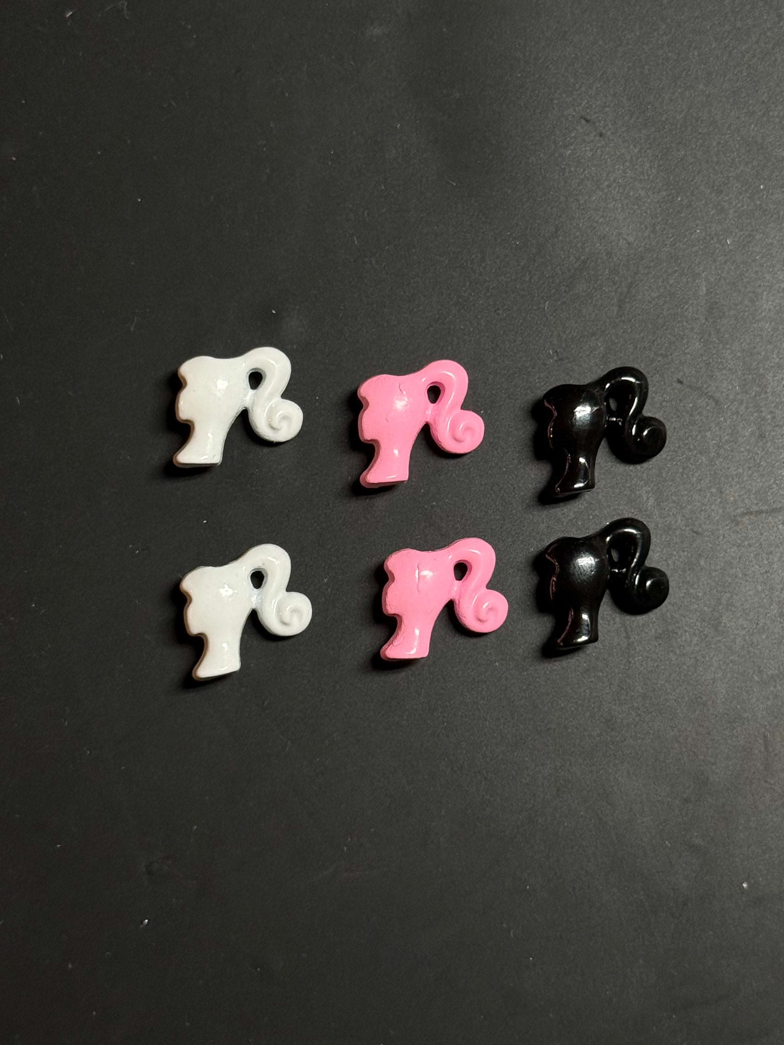 Small barbie head charm